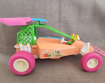 1986 Arco/Mattel Tropical Barbie Dune Buggy, fair condition, complete except for parrot that goes on top; has been repaired on green rollbar