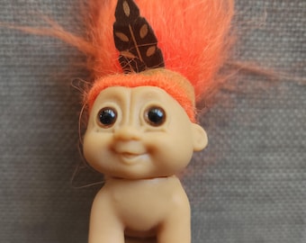 1980s Vintage Native American Indian Crawling Baby Troll, has breechcloth, orange hair, headband with feather, excellent condition, by Russ