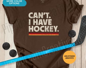Kan inte. Ha hockey rolig vintage grafisk t-shirt