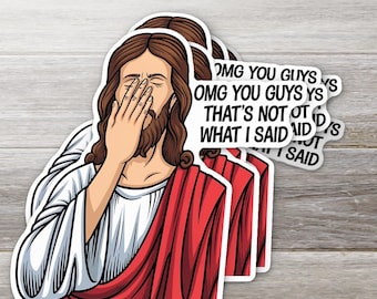 May include: A stack of stickers depicting a cartoon Jesus covering his face. He wears a red robe and white tunic. The stickers have text that reads "OMG YOU GUYS, THAT'S NOT WHAT I SAID." The website ozstickerco.com is visible.