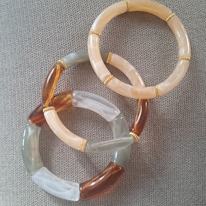 Semi-rigid bangle bracelet