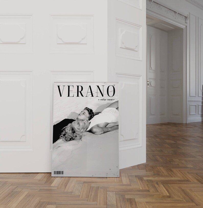 May include: Black and white magazine cover with the title "VERANO: a vintage summer" and a photo of two people lying on a beach.