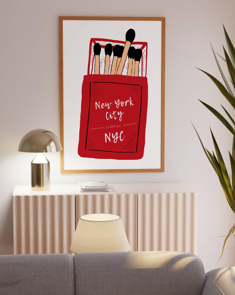 May include: A red matchbox with the text "New York City Classic NYC" and a drawing of matches inside.
