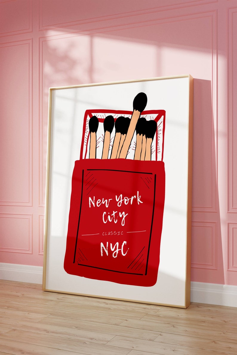 May include: A red matchbox with the text "New York City Classic NYC" and a drawing of matches inside.