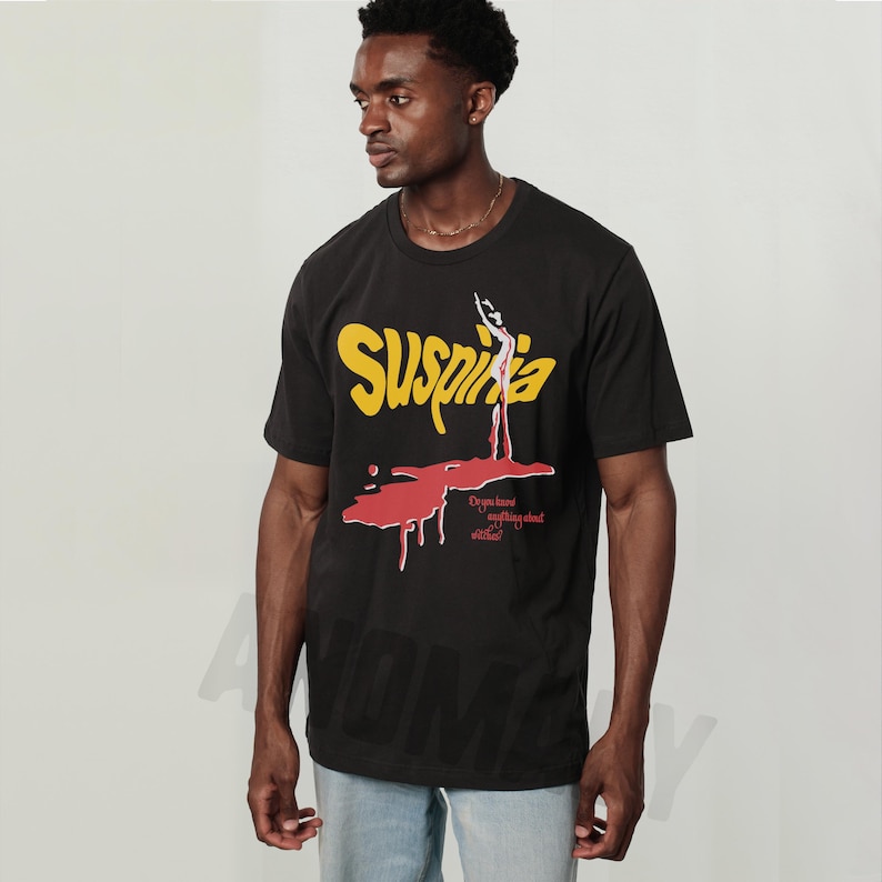 Vintage Suspiria 1977 horror movie t-shirt, retro 70s Italian horror movie suspiria movie poster graphic on oversized black unisex shirt