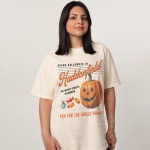 Retro Halloween 1979 Horror movie t-shirt on oversized beige and orange shirt, vintage Halloween in Haddonfield Michael Myers graphic tee for men and women