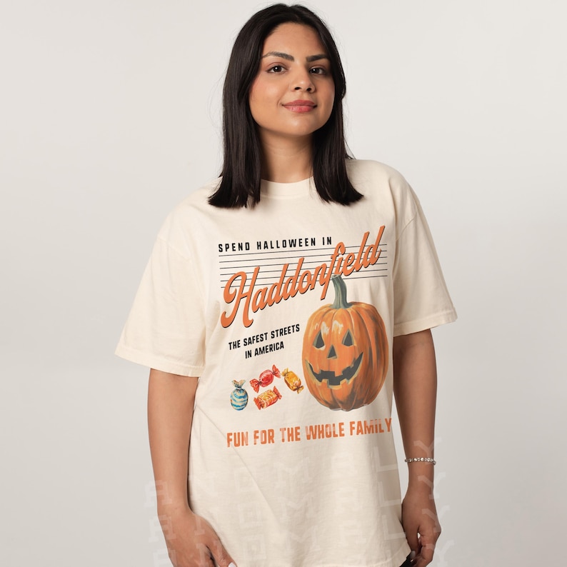Retro Halloween 1979 Horror movie t-shirt on oversized beige and orange shirt, vintage Halloween in Haddonfield Michael Myers graphic tee for men and women