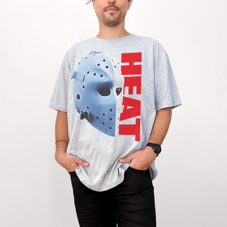 90s Action Movie T-Shirt: Heat Hockey Mask Graphic Tee from 1995 Sport Grey