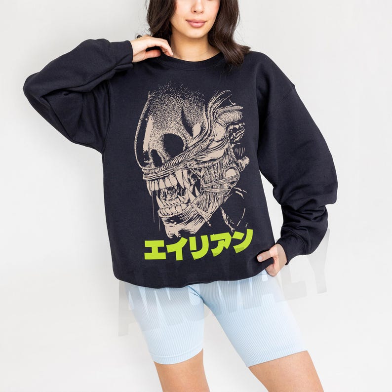 Retro original Alien movie sweatshirt, unisex sci-fi horror movie crewneck sweatshirt with Japanese movie poster text and streetwear style design on an oversized black sweater