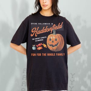 Retro Halloween 1979 Horror movie t-shirt on oversized black and orange shirt, vintage Halloween in Haddonfield Michael Myers graphic tee for men and women