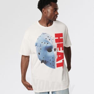90s Action Movie T-Shirt: Heat Hockey Mask Graphic Tee from 1995 White