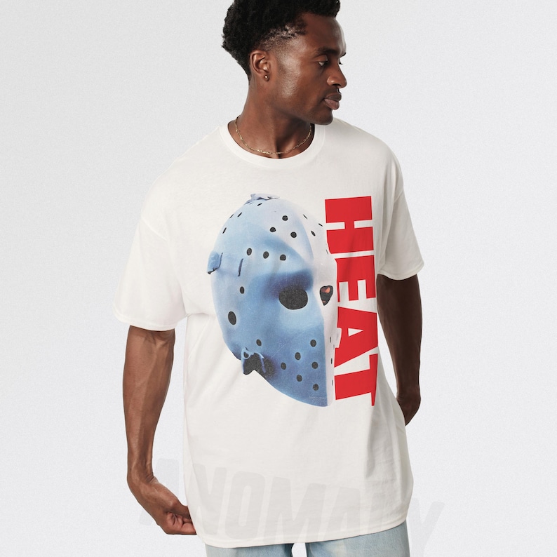 90s Action Movie T-Shirt: Heat Hockey Mask Graphic Tee from 1995 White