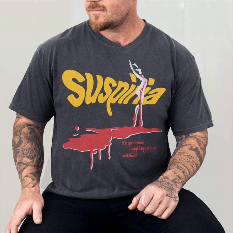Vintage Suspiria 1977 horror movie t-shirt, retro 70s Italian horror movie suspiria movie poster graphic on oversized washed black comfort colors tee shirt