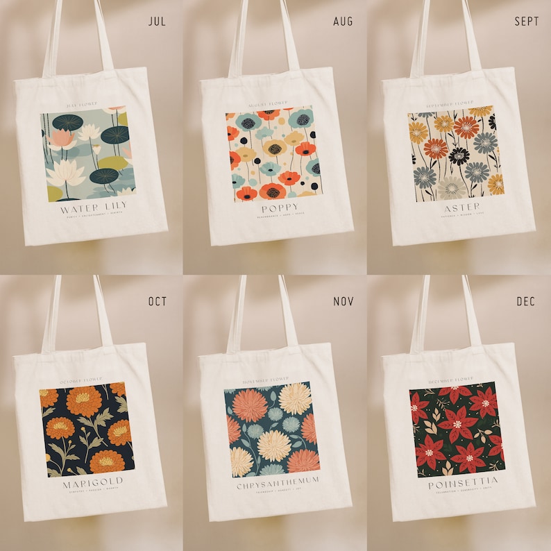 May include: Six white tote bags with different floral designs and month names printed on them. The designs include water lily, poppy, aster, marigold, chrysanthemum, and poinsettia.