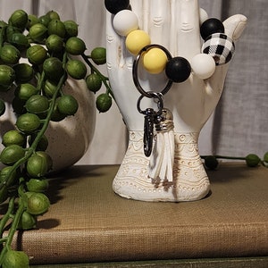 Bolso de mano con forma de abejorro
