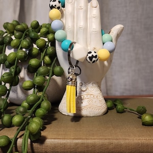 Bolso de mano de vaquera en tonos pastel