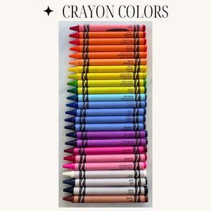 May include: A set of 24 crayons in a rainbow of colors, including red, orange, yellow, green, blue, purple, brown, black, and white. The crayons are arranged in order of color, with the darkest colors at the bottom and the lightest colors at the top. Each crayon has a label with the color name in English and French.