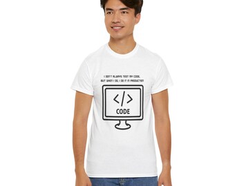 May include: White t-shirt with a black and white graphic of a computer screen with the text "</> CODE" and the text "I don't always test my code, but when I do, I do it in production."