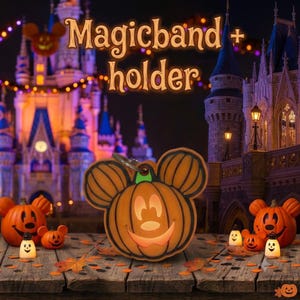 May include: A pumpkin-shaped Magicband holder with a Mickey Mouse silhouette, featuring a carved jack-o'-lantern face with a wide grin, orange and black coloring, and a metal keyring attachment at the top, set against a castle background.