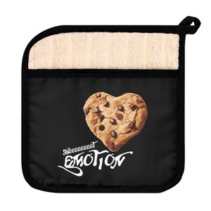 May include: Black pot holder with a heart-shaped chocolate chip cookie graphic and the text "SWEETEST EMOTION" in white. The top section is beige terry cloth. The pot holder has a black border and a loop for hanging.