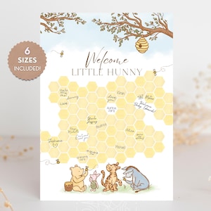 May include: A baby shower guest book with a Winnie the Pooh theme. The design features a honeycomb pattern for guests to sign, with the words "Welcome Little Hunny" at the top. The image includes illustrations of Pooh, Piglet, Tigger, and Eeyore.