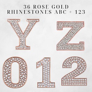 May include: Rose gold letters and numbers covered in rhinestones. The letters are Y and Z. The numbers are 0, 1, and 2.