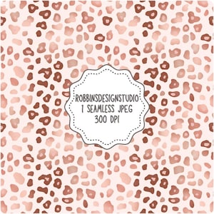 以下が含まれることがあります： 茶色とピンクの色合いのシームレスなヒョウ柄パターン。デザインは、明るいピンク色の背景に不規則な斑点があります。画像には「ROBBINSDESIGNSTUDIO 1 SEAMLESS JPEG 300 DPI」というテキストが含まれています。