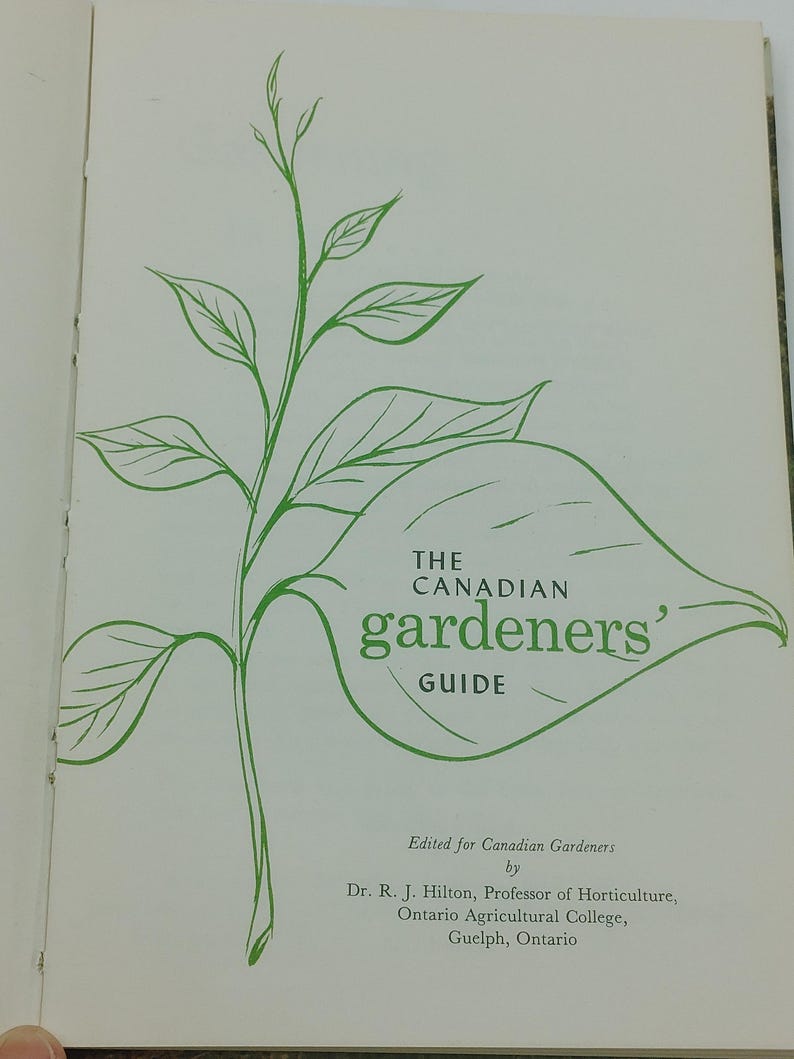 May include: Open book with a green illustration of a plant and text. The title reads "The Canadian Gardeners' Guide." Below the title is the text "Edited for Canadian Gardeners by Dr. R. J. Hilton, Professor of Horticulture, Ontario Agricultural College, Guelph, Ontario."