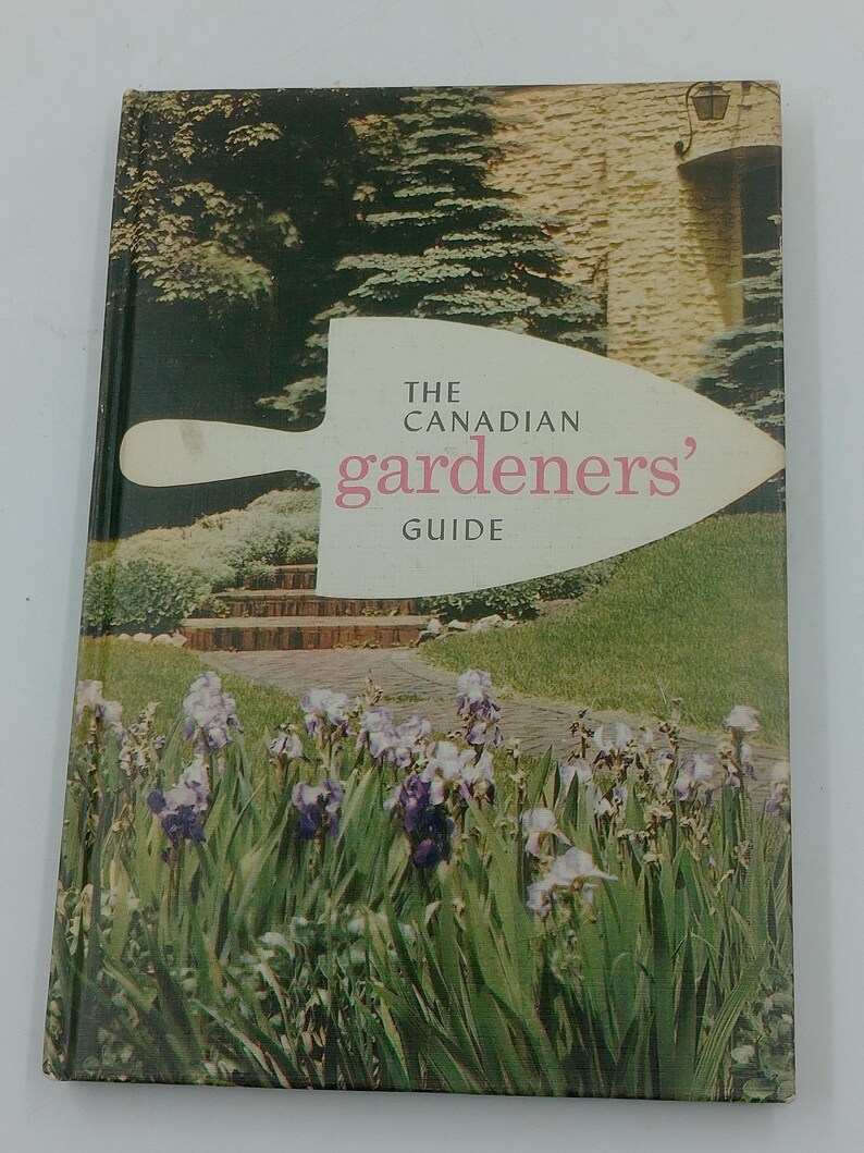 May include: A vintage book titled "The Canadian Gardeners' Guide." The cover features a garden scene with a path, steps, and flowers. The title is in white and pink, set against a trowel illustration.