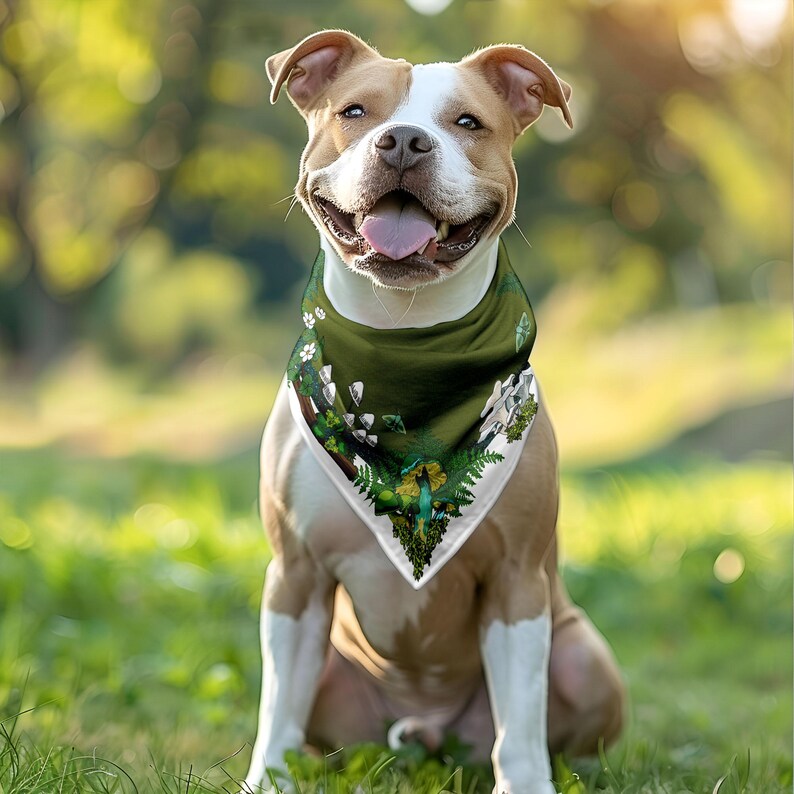 This is a photo of a brown and white dog with the green mushroom bandana scarf tied around his neck.