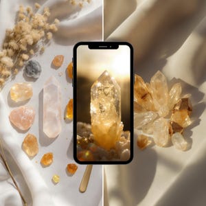 May include: A collection of crystals and gemstones in shades of yellow, orange, and pink. A smartphone displays a close-up of a crystal with sunlight shining through it. The crystals are arranged on a white surface with dried flowers.