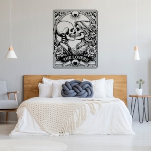 May include: A black and white wall decal featuring a tarot card design titled THE LOVERS. The illustration depicts two skeletons facing each other in a romantic pose, surrounded by ornate floral patterns, roses, and a sun symbol at the top.
