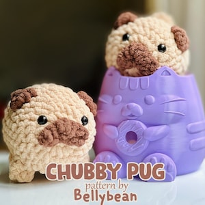 May include: Two crocheted pug dog plushies, one in a purple cat-shaped container. The container has a donut in its paws. The text "Chubby Pug pattern by Bellybean" is at the bottom of the image.