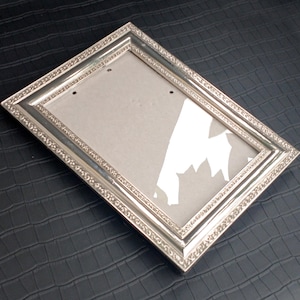 Vintage silver plated photo frame. For Photos 10 x 15.  Vintage tabletop photo frame. with glass and original back velvet backing.
