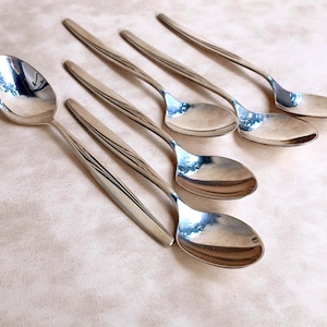 Vintage silver plated tea spoons WMF patent-90 in the original box. Tea or coffee spoons. Silver-plated dessert spoons.