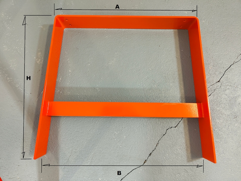 May include: Orange metal stand with a rectangular frame and a horizontal bar. The stand is 24 inches wide, 16 inches tall, and 10 inches deep.
