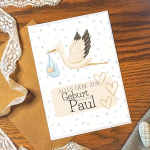 Gepersonaliseerd geboortekaartje met ooievaar en baby | Naam en datum kunnen gepersonaliseerd worden| Lieve wenskaart in A6 formaat voor de geboorte van een kindje