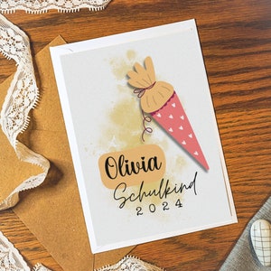 Carte pour la rentrée scolaire avec cône scolaire et arc-en-ciel Carte postale personnalisée / carte pliante pour la rentrée scolaire d'un enfant | Nom de l'écolier