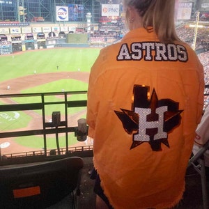 Astros present Bad Bunny with jersey after Minute Maid Park show