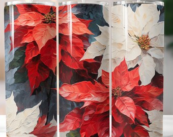 Könnte beinhalten: Drei Edelstahlbecher mit einem roten und weißen Weihnachtsstern-Blumendesign. Die Becher sind perfekt für heiße oder kalte Getränke.