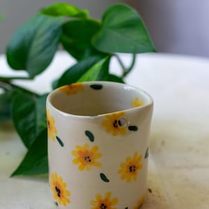 Handmade ceramic travel mug
