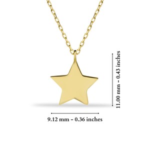 May include: A gold chain necklace with a star pendant. The star is 9.12 mm wide and the chain is 11.00 mm long.