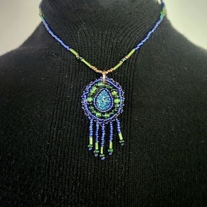Mother Earth beaded medallion necklace with fringe - blue, green