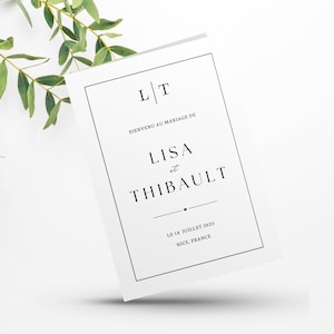 Peut inclure: Une invitation de mariage blanche avec du texte noir. L'invitation indique "LIT" dans le coin supérieur gauche, suivi de "Bienvenue au mariage de Lisa et Thibault" et "Le 18 Juillet 2015 Nice, France".