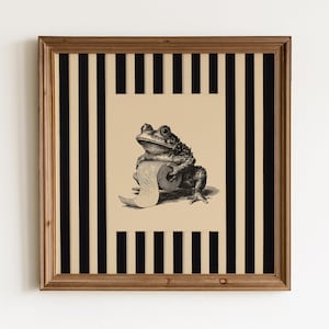 Grappige vintage poster met een kikker die een wc-rol vasthoudt, zwarte inkt schets van een kikker, gestreepte vintage muurdecoratie, grappige badkamerkikker muurdecoratie.