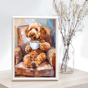 May include: A framed painting of a brown Goldendoodle dog seated in a brown armchair, holding a white coffee cup. The dog has curly fur and a black collar. The background features abstract brushstrokes in shades of brown, blue, and white.