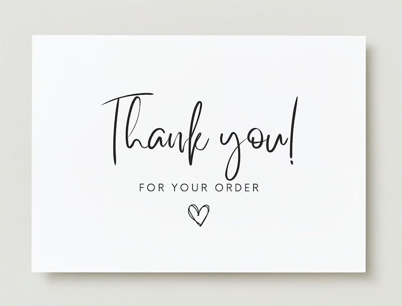 May include: A white card featuring the words "Thank you!" in stylish black script. Beneath, the text "FOR YOUR ORDER" is printed, with a small heart illustration. The design is minimalist and expresses appreciation.