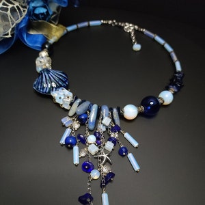 Gemstone necklace with opalite beads and ceramic shell, Marine necklace with crystals and cluster pendant, Waterfall necklace