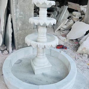 marble water fountain , home , garden