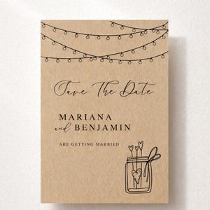May include: A rustic-style wedding invitation with the text "Save The Date" and the names "Mariana and Benjamin". The design includes string lights and a mason jar illustration with hearts. The words "Are Getting Married" are also included.